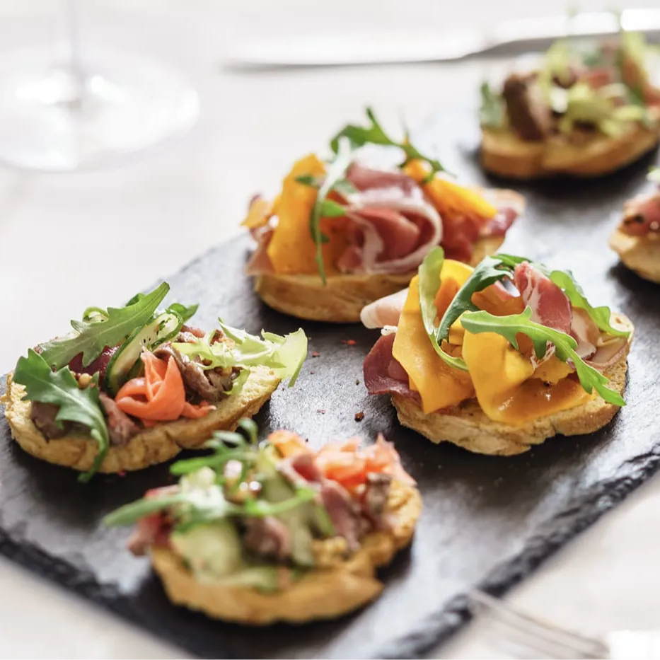 Appetizers on a serving tray for passed service at a private event