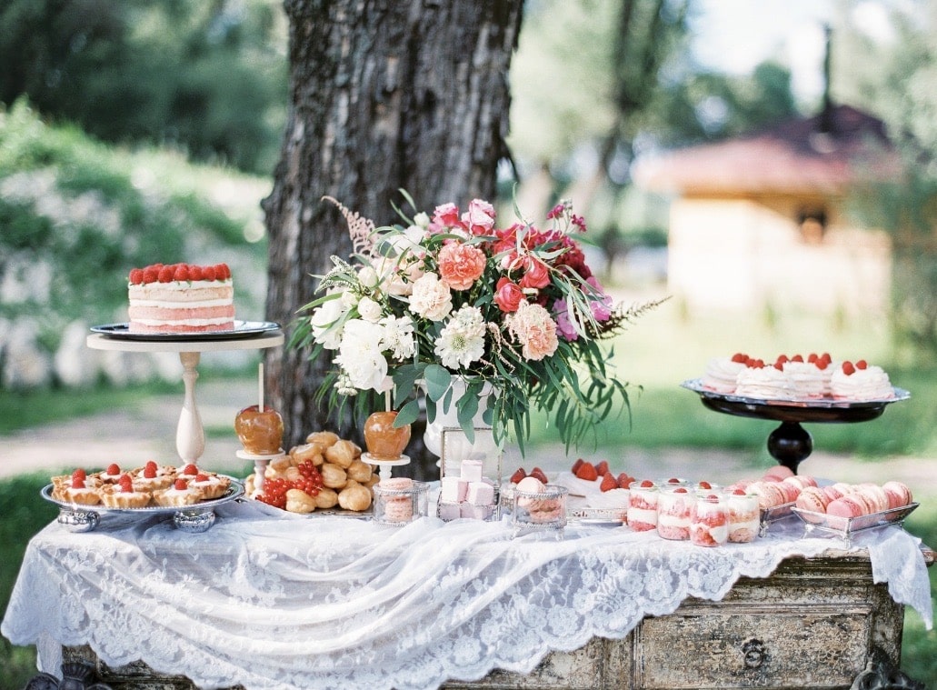 Wedding bouquet and dessert station