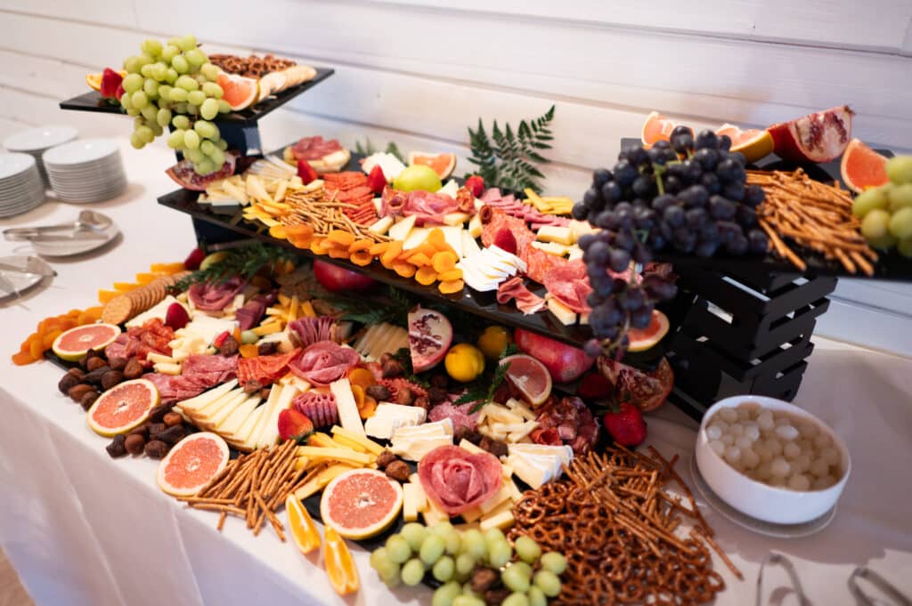 An incredible charcuterie buffet setup for a wedding reception